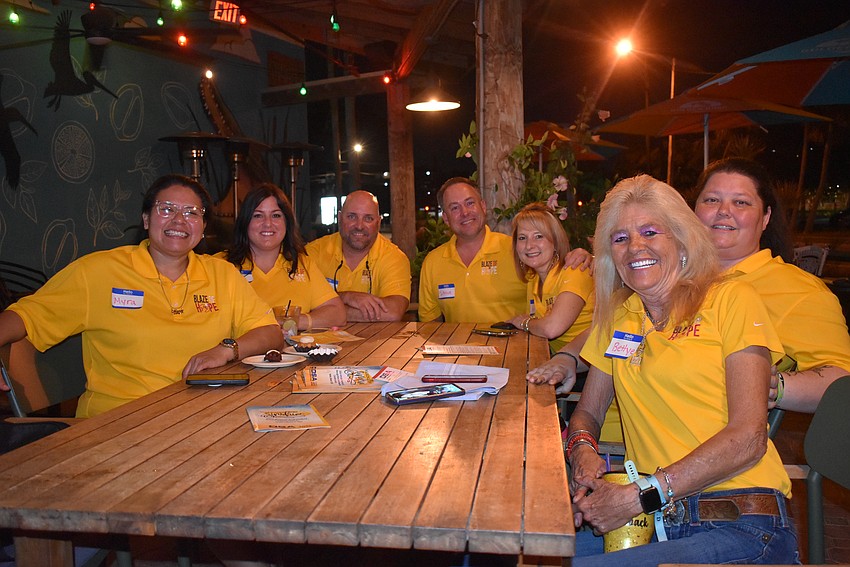 Myra and Lisa Moore, Ben Lalande, Blaze of Hope President Shawn Platt, Dawn Grooms, April Barnes and Bettye Restle.