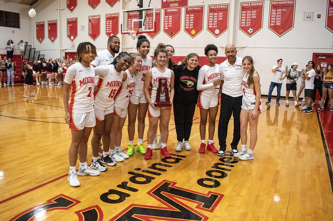 The Cougars girls basketball team is headed to states for the third consecutive year.
