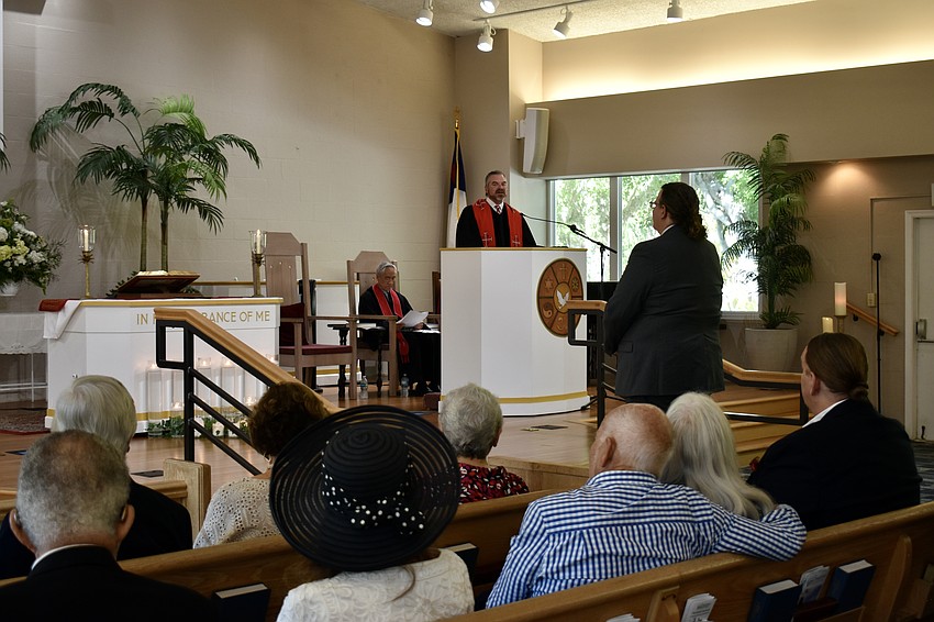 Rev. Brock Pastor leads the commission ceremony on Feb. 21.
