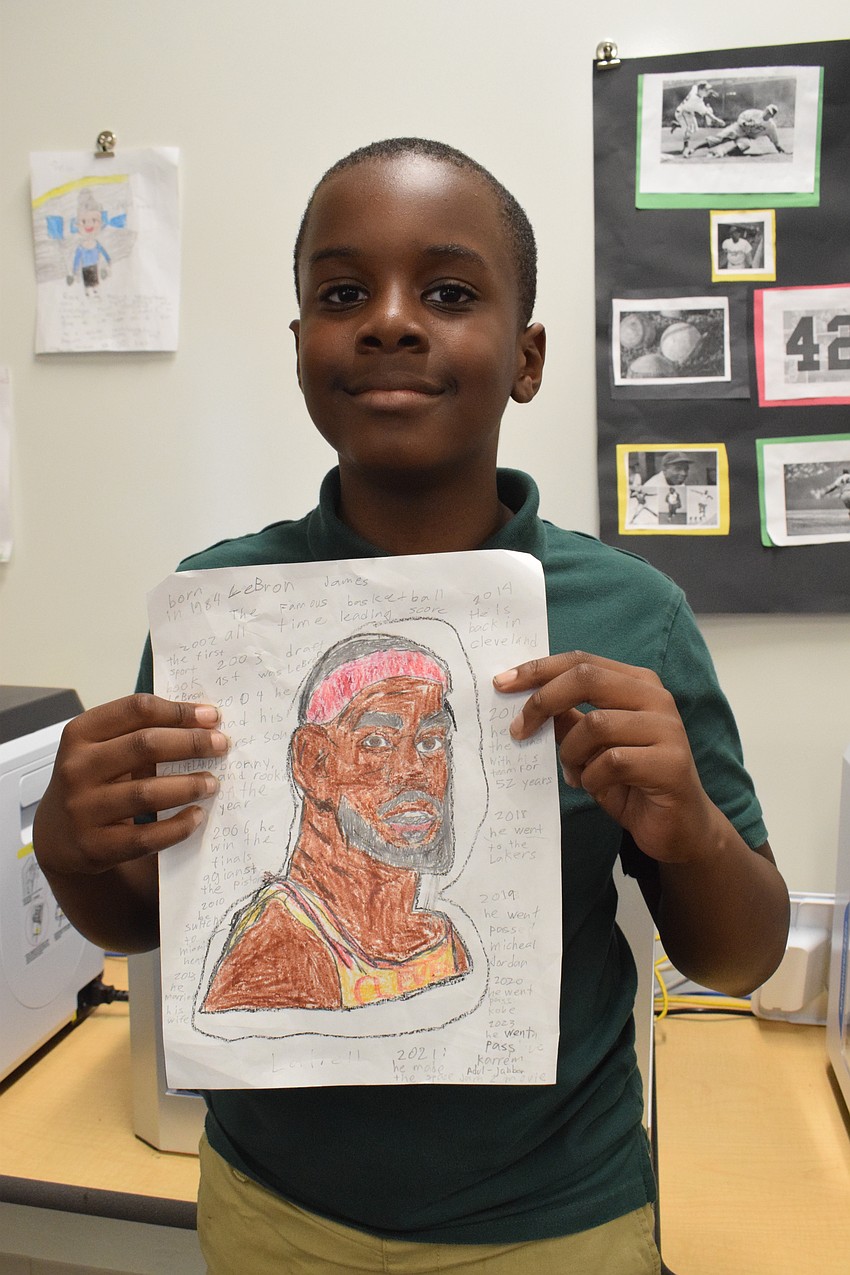 Third grader Latrell Watson chooses to learn about LeBron James because 