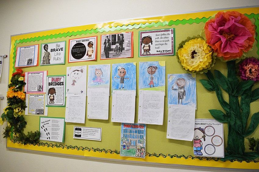 Students have their work on prominent Black Americans displayed in the hallways as a walking museum. Students wrote about Rosa Parks, Ruby Bridges, Jackie Robinson, George Washington Carver and others.