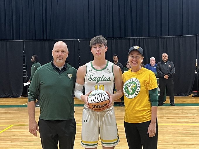 At 6-foot-6, senior, shooting guard and swingman for the CFCA Eagles Ty Gustafson scored his 1,000 career point during the last game of his high school season.