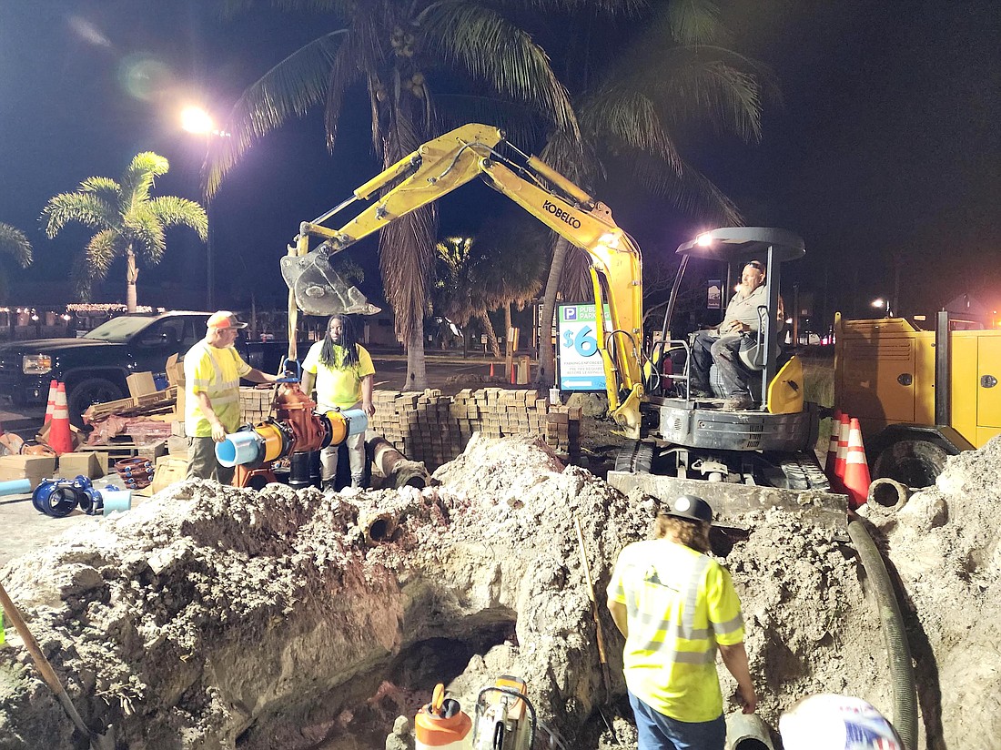 Crews work overnight Tuesday to repair and replace hydrants and valves in Sarasota County's water system on Siesta Key.
