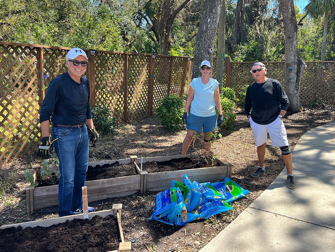Esplanade at Lakewood Ranch's George Scherff, Robyn Kaiserman and Martin Hartmann, who are a part of the Sorrento Gang, volunteer at the Florida Center for Early Childhood.