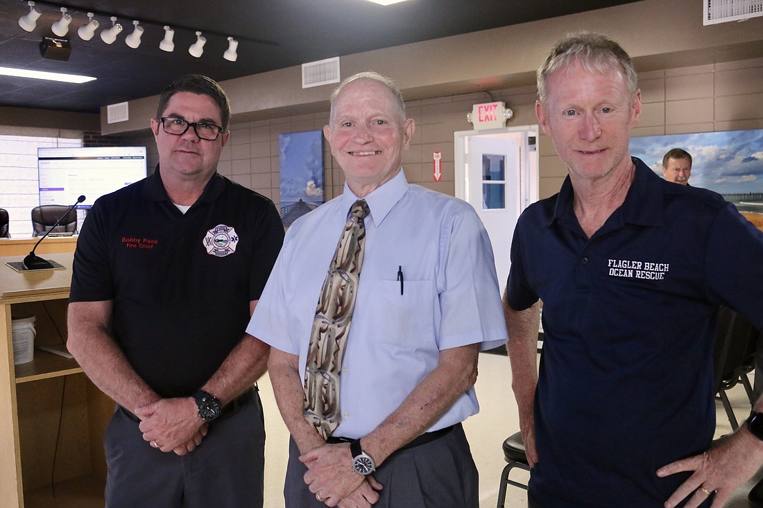 Flagler Beach Fire Chief Bobby Pace, new Interim Flagler Beach City Manager Mike Abels and Flagler Beach Ocean Rescue Director Tom Gillan