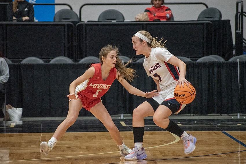 Mooney sophomore Josie Maloni guards Miami Country Day's Kristina Godfrey.