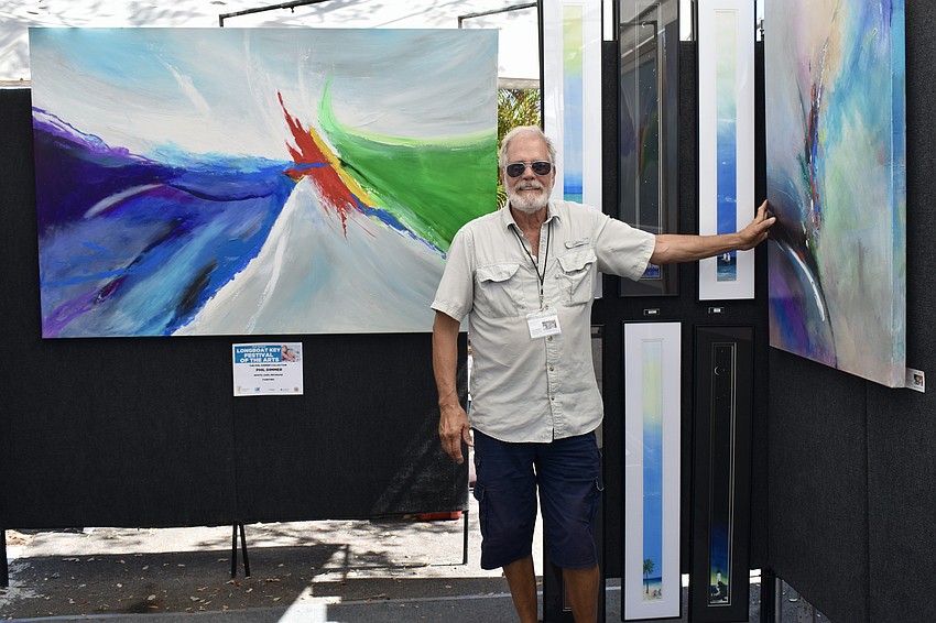 This is Phil Dimmer's 51st year of traveling to art shows. He started with watercolors and now uses acrylics for his paintings.