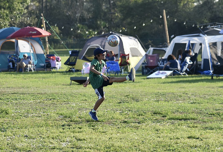 Greenbrook 9-year-old Henry Budde found the Community Campout to be a good time to work on his soccer skills.
