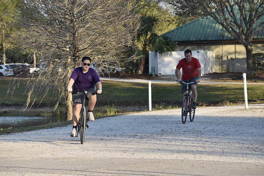 Greenbrook's 13-year-old Drake Cohen, and Tom Cohen, brought their bikes to the Community Campout for a little exercise.