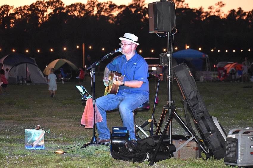 Bradenton's Justin Layman provides the entertainment at the Community Campout at the Adventure Park.