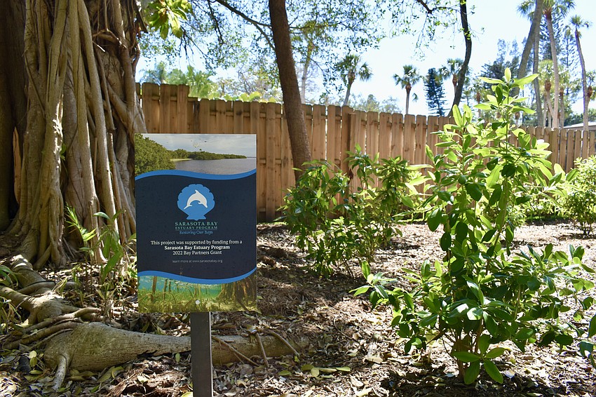 A completed landscape project in Banyan Bay is marked with a sign from the Sarasota Bay Estuary Program.