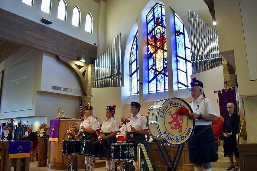 The Lion Rampant Pipe & Drum band plays at Christ Church.