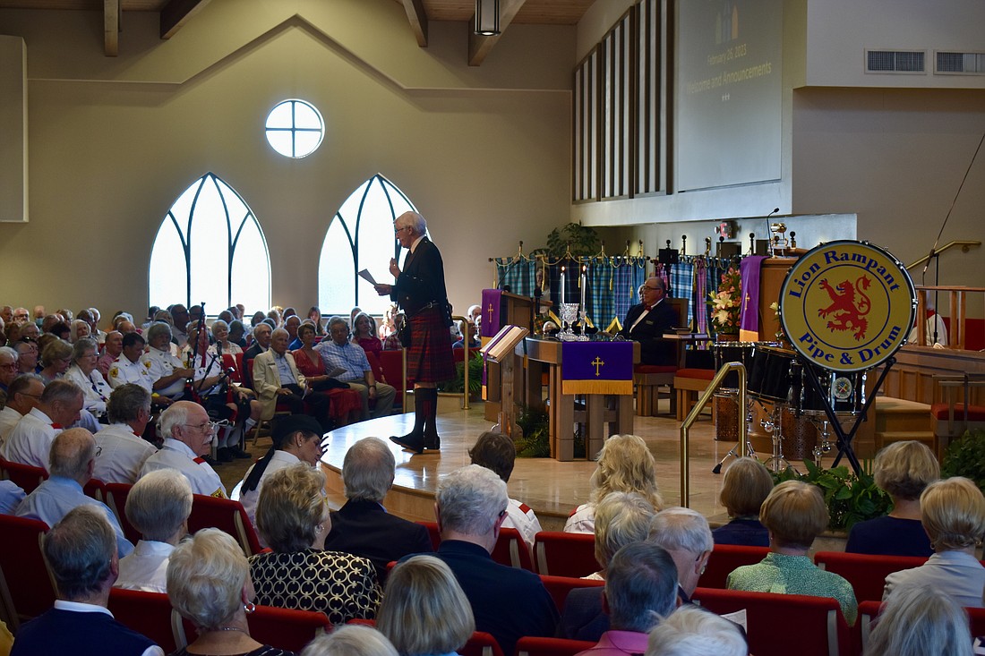 Pastor Norman Pritchard preaches to over 400 people on Sunday.