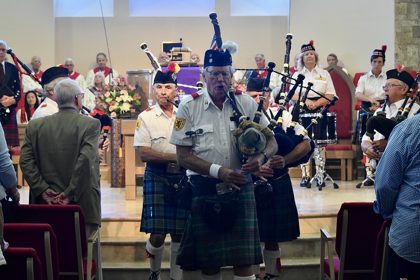 Marty Gray leads the band out.