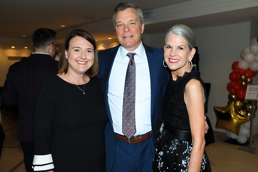 Stacey and Michael Corley with Sally Schule