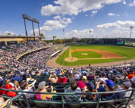 Revamped ballpark, with bank as naming rights sponsor, opens for spring  training