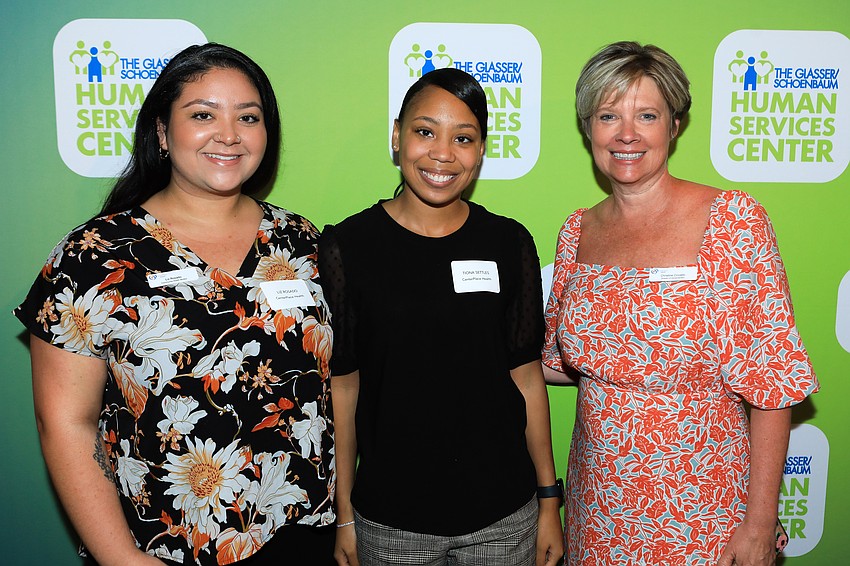 Liz Rosado, honoree Tiona Settles and Christine Coviello