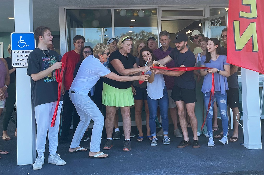 Sips owners Justina Condensa and Chris Carter celebrated their grand opening March 1.
