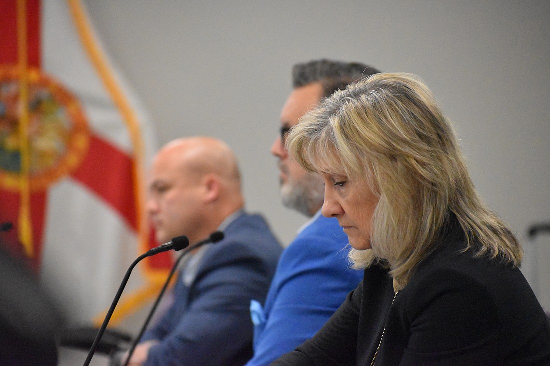 Commissioners Jason Bearden, Mike Rahn, and Vanessa Baugh discuss former Administrator Scott Hopes' resignation Feb. 7.