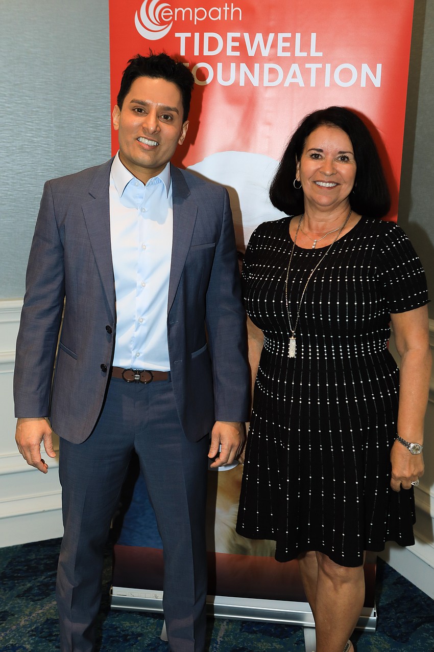 Speaker Dr. Sudip Bose and chairwoman Kathy Martella