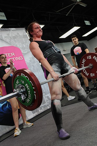AJ Kowalski deadlifted 325 pounds at the Rosie the Riveter Women's Powerlifting Championship meet.