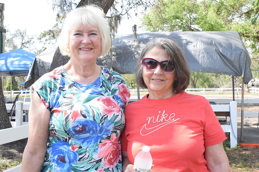 Myakka City's Karen Pitts attends a Herrmann's Royal Lipizzan Stallions performance for the first time with Pam Conrad, who is visiting from Ohio. 