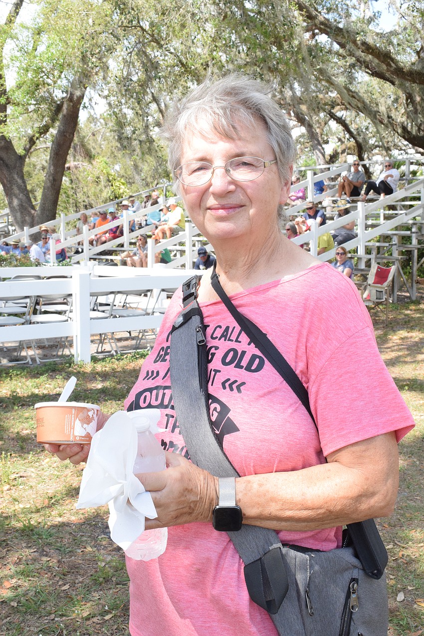 Myakka City's Betty Ann Brown enjoys some strawberry shortcake before seeing Herrmann's Royal Lipizzan Stallions perform. She had only seen them perform once before in Tampa. 