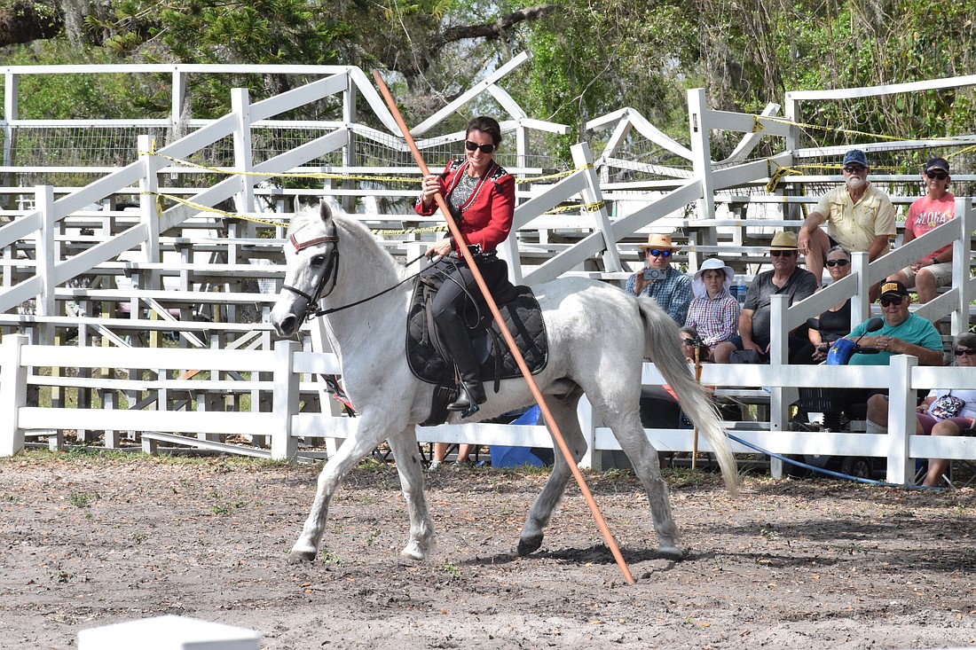 Rebecca McCullough performs a Spanish discipline.