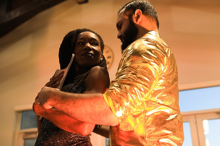 Commissioner Erik Arroyo and Monessa Salley acted out a magazine cover dance.