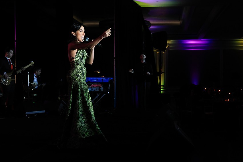 Ana Isabelle sings for the crowd.