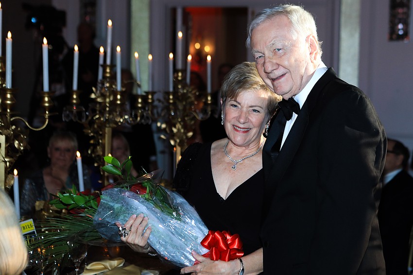 John Welch gives Linda DiGabriele flowers for her time with the theater.