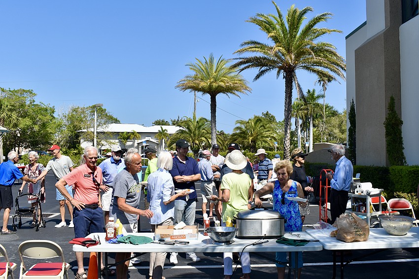 About 40 members and neighbors have a barbecue at Christ Church on March 4.