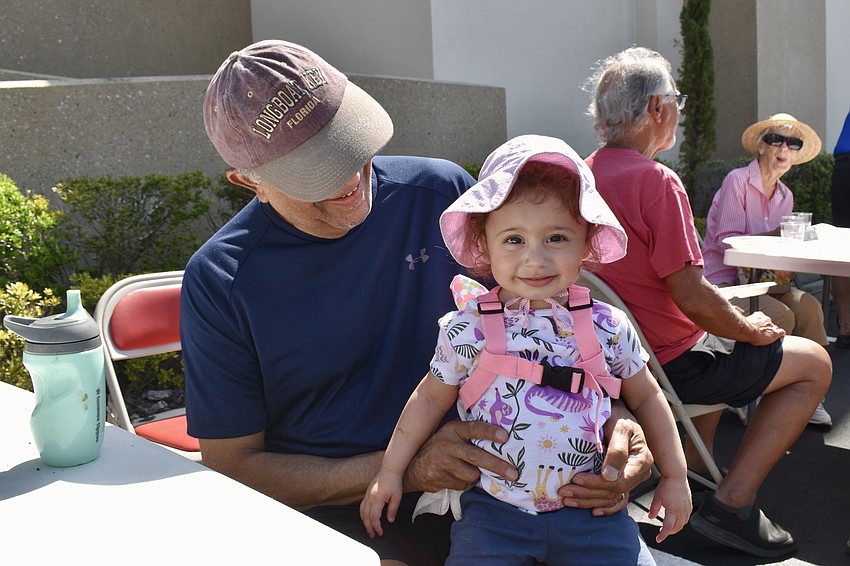 Ravi Venkataraman brings his grandaughter Addy with him.