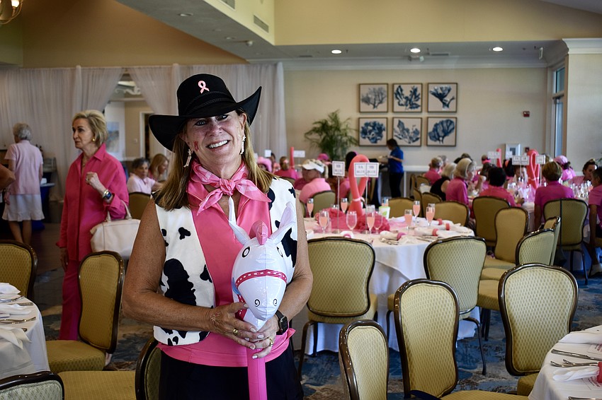 Jan Henry dresses as a cow girl for Go for the Cure.