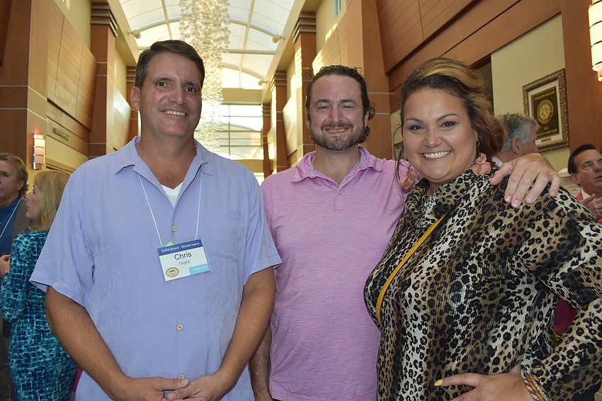 St. Armands Residents Association President Chris Goglia, Serge and Sonia Gauthier.