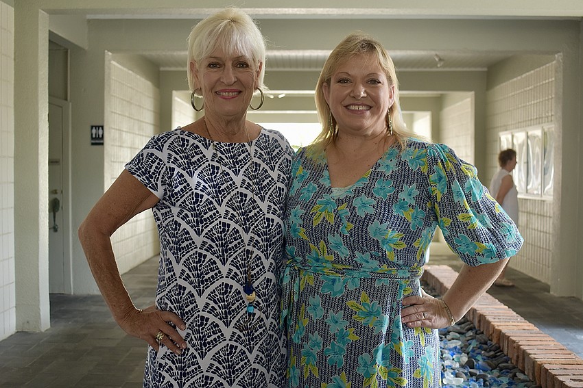 Hatley Boutique sales associate Nancy Montgomery and store manager Lisa James showcase their clothings at Longboat Harbour Fashion Show.