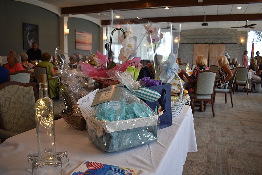 Attendees were eligible for door prizes from various local businesses including Shore, Harry's Continental Kitchens and Dry Dock Waterfront Grill.
