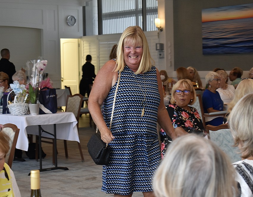 Tina Liccardi walks down the catwalk at Longboat Harbour Fashion Show.