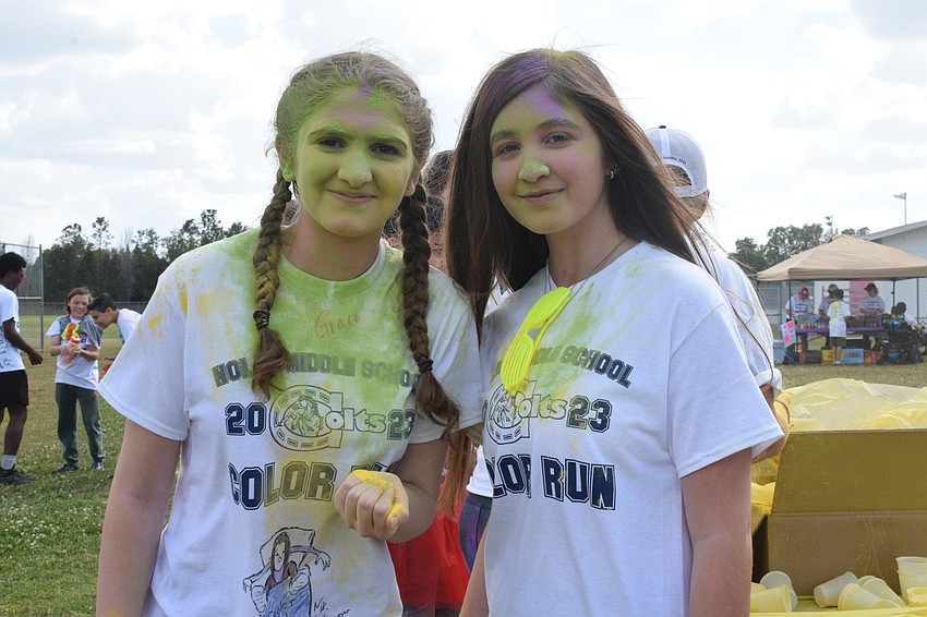Eighth graders Olivia Cole and Elena Margioukla get their first hit of color. 
