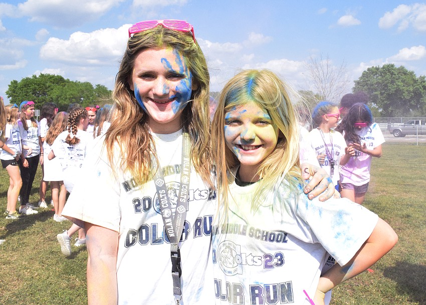 Sixth graders Avery Ruffing and Adyson Shortridge have no problems with getting color in their hair.