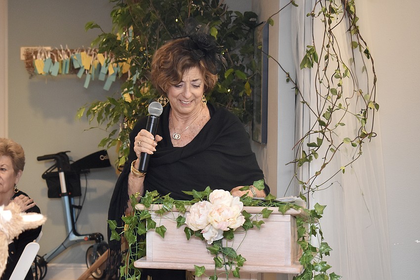 Lesley Rife emcees the fashion show.