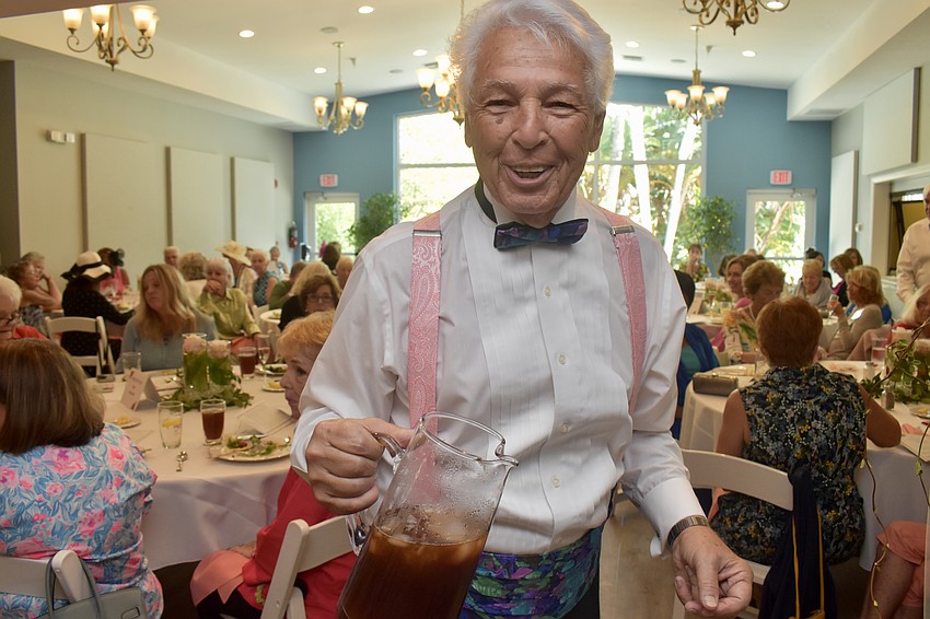 Tom Vitro serves as waiter for the day.