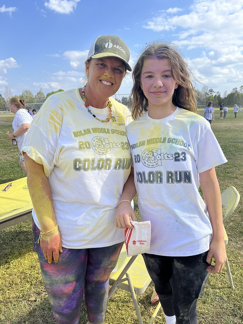 Deborah Hossenlopp enjoys the Color Run with her sixth grader Quinn Hossenlopp.