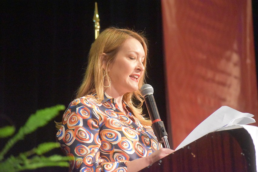 Observer Media Group President Emily Walsh speaks to the crowd