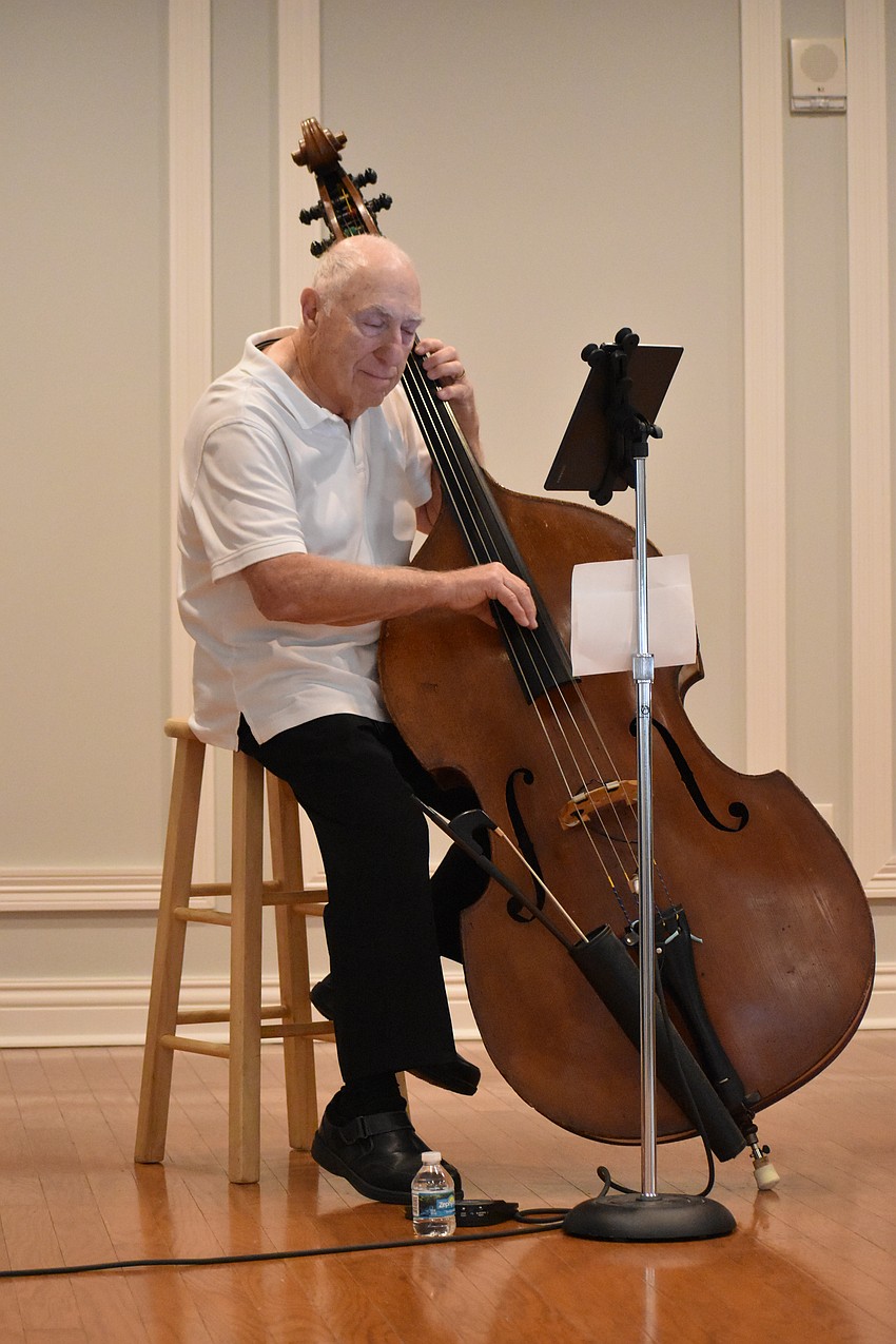 Cascades' Stu Krams provides live music at the fashion show.