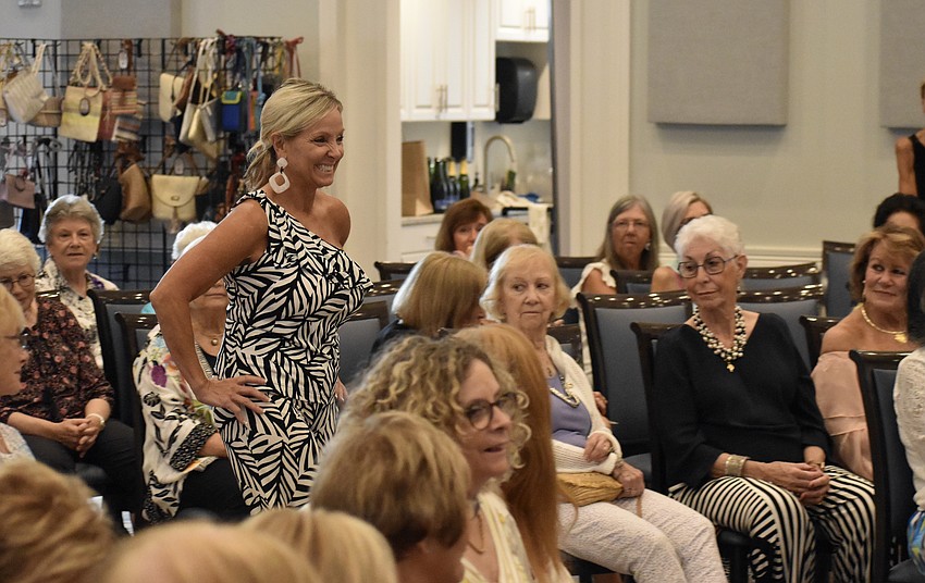 Lisa Devivo brings a new dress and a radiant expression to the runway.