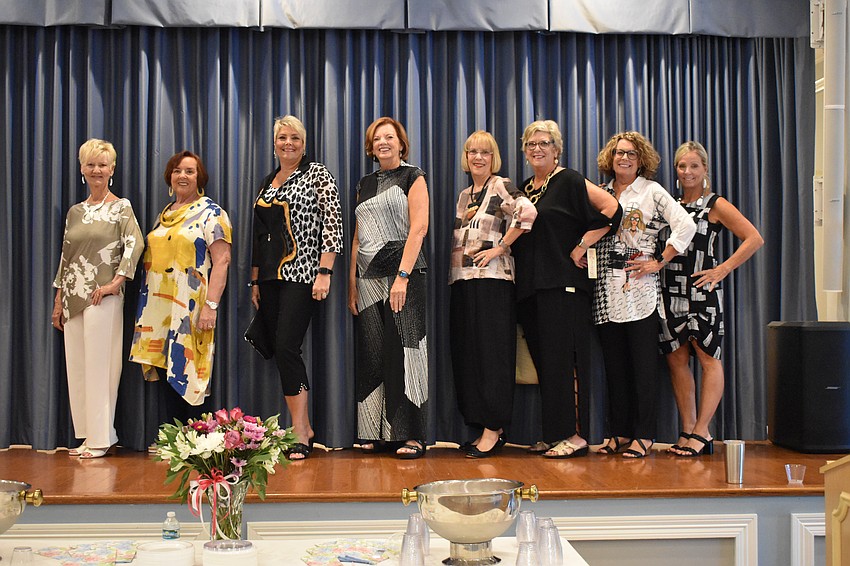 Models include Women's Club of Cascades members Chris Wertz, Sue Rosenfeld, Maria Salerno, Sherry Kenny, Ann King, Terrie Thorstad, Bonnie Versele, and Lisa Devivo.