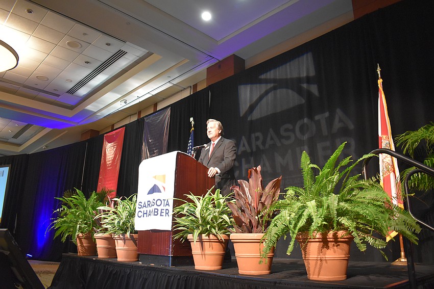Sarasota Chamber Vice President Ed Hill speaks to the audience.