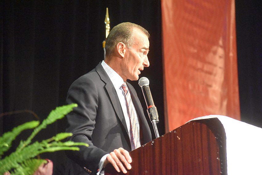 HH Staffing Owner Darrin Rohr addresses the crowd