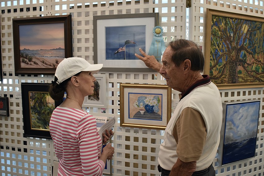 The Meadows' Patricia Scalia learns from John Scoedler about his photograph 